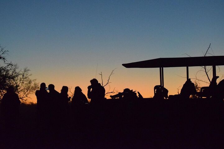 Guests on winter game drive in Madikwe Game Reserve